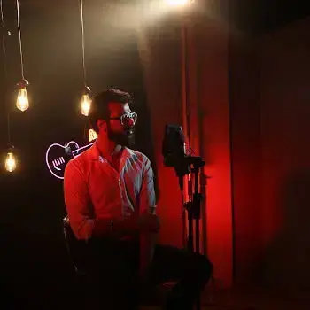 Artist recording under studio lights