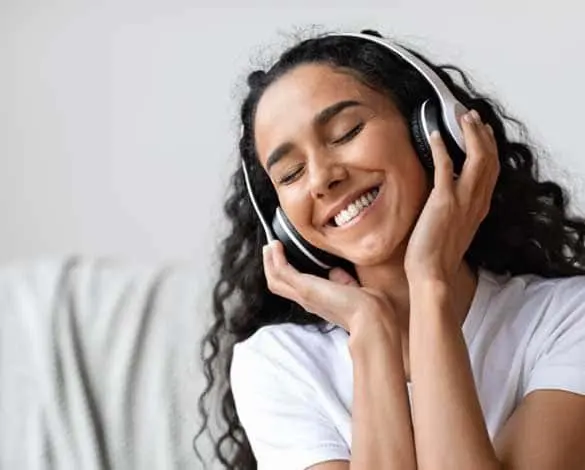 Listener enjoying music on headphones